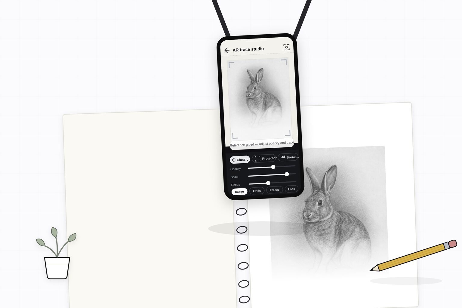 Illustration: a phone on a tripod arm suspended above a sketchbook with a clear air gap, the AR trace studio showing a rabbit reference over the page