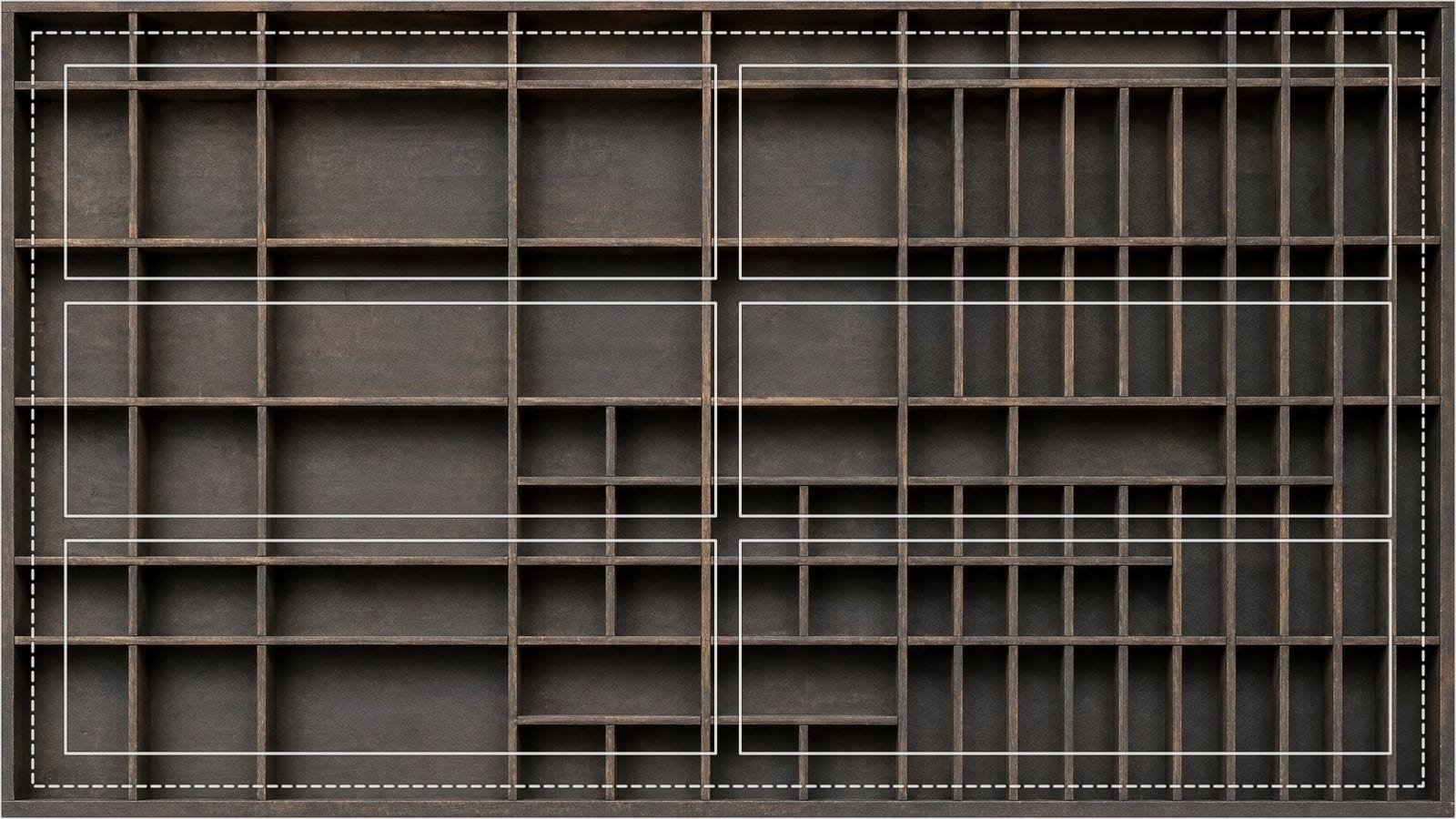 Comic page grid overlay on a printer's tray divided into rows of unequal compartments