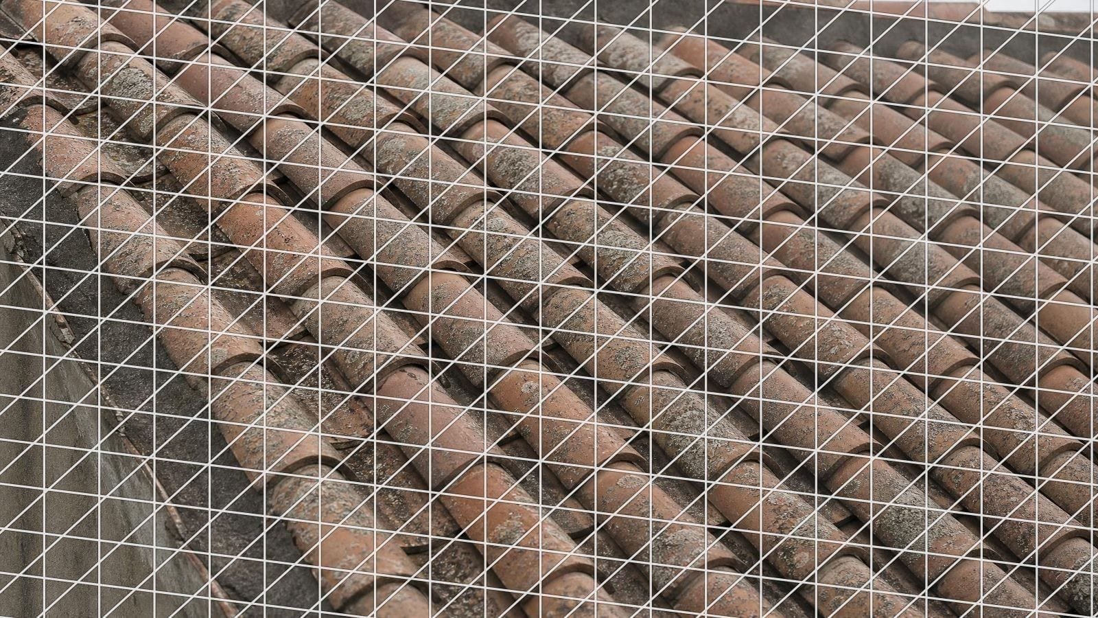 Dimetric grid overlay on a terracotta pantile roof with courses running at two angles