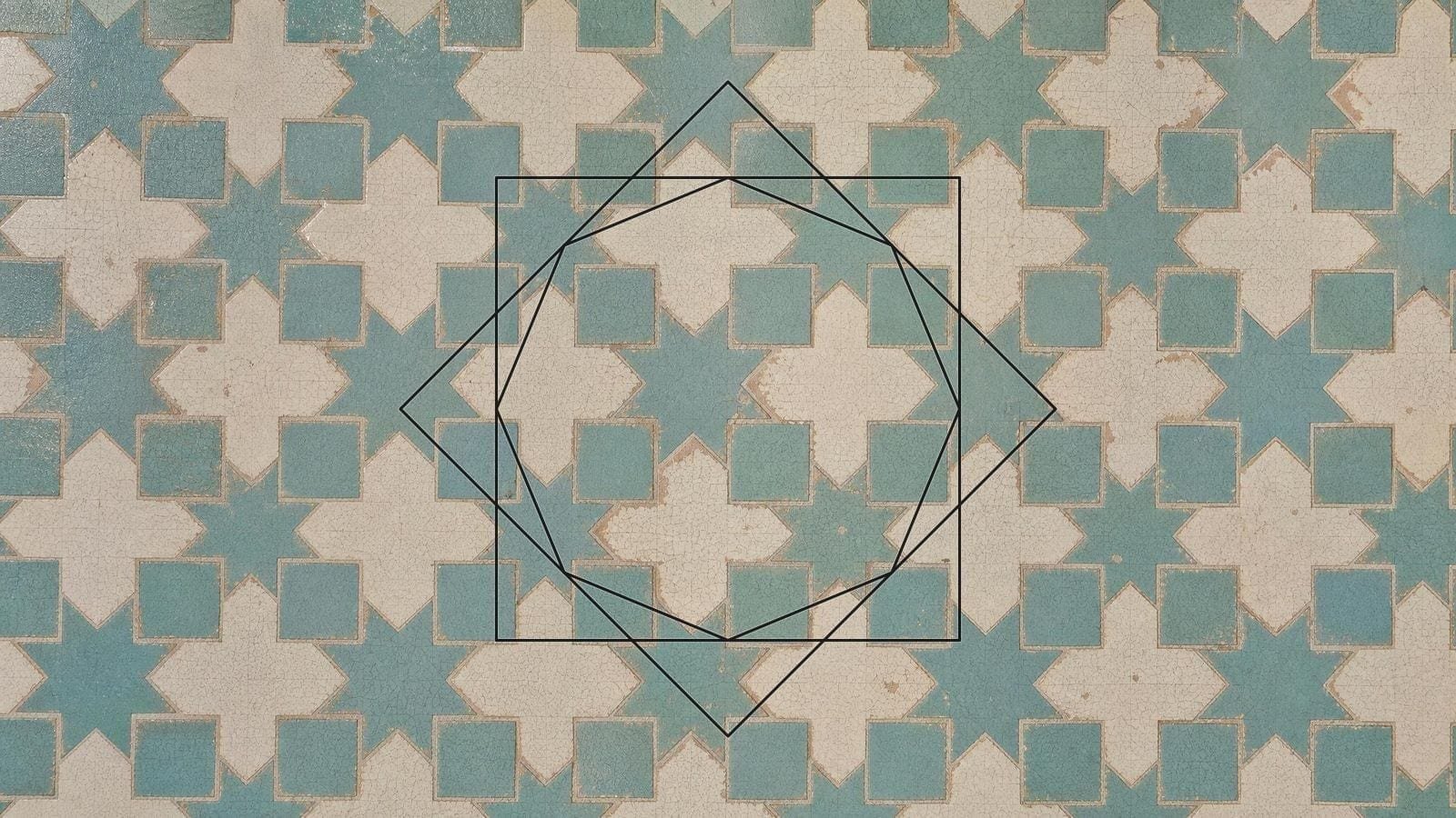 Islamic eight-pointed star overlay on a glazed tile floor of stars and crosses