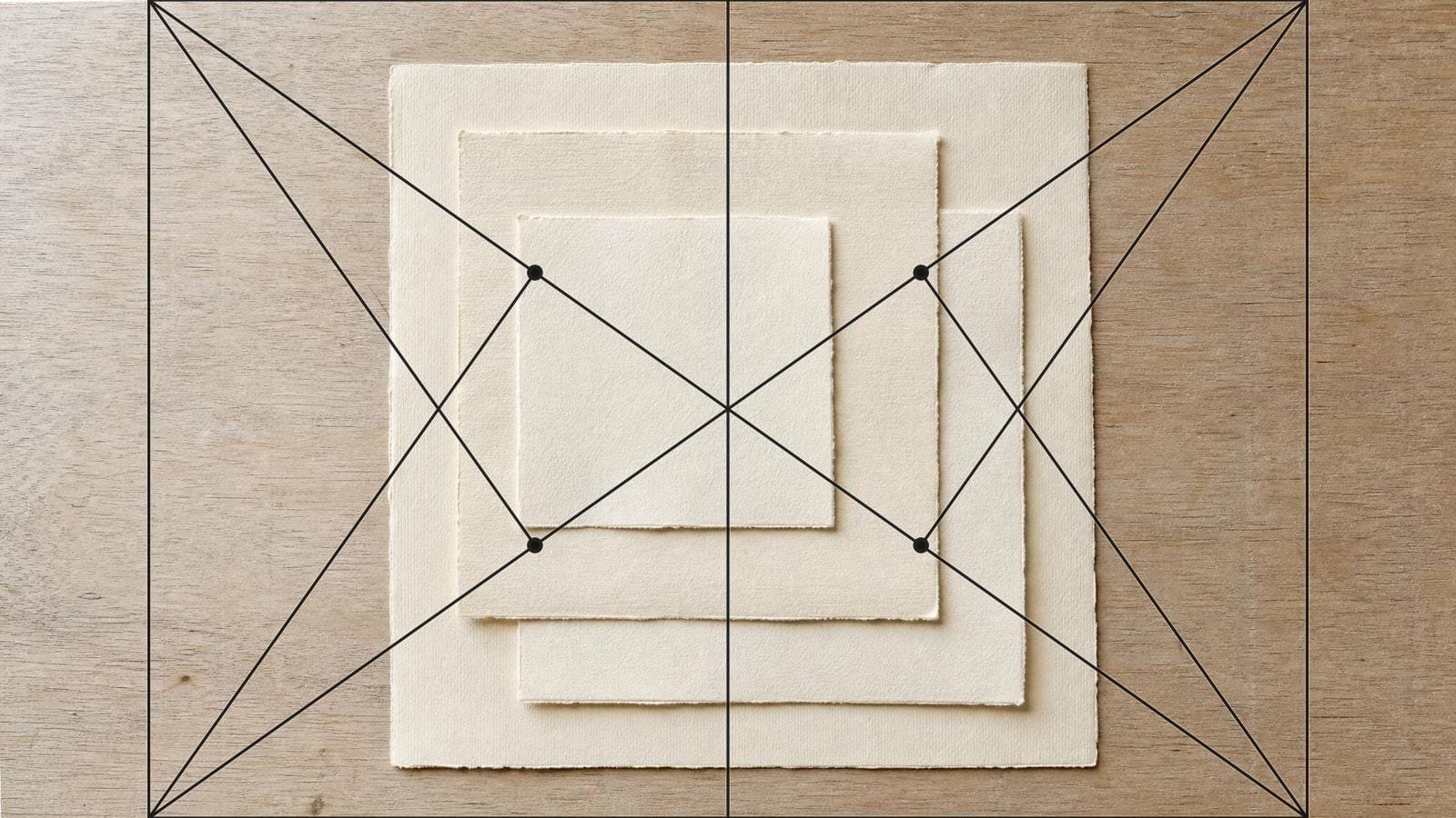 Root 2 armature overlay on stacked paper sheets, each one half the sheet beneath