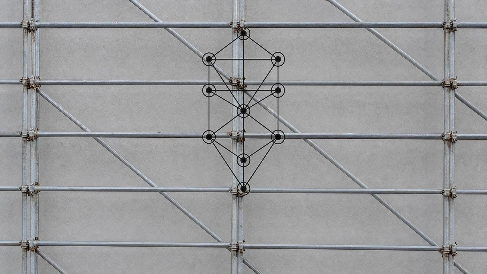 Tree of Life overlay on tube scaffolding, standards and ledgers meeting at couplers